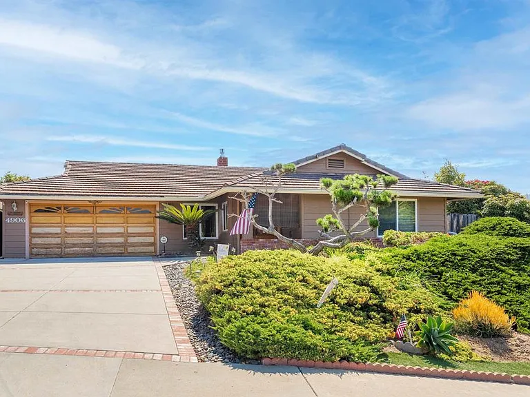 Main photo of 4906 Via Hinton Carlsbad CA 92008 family home on a cul-de-sac with 50-year roof and solar panels