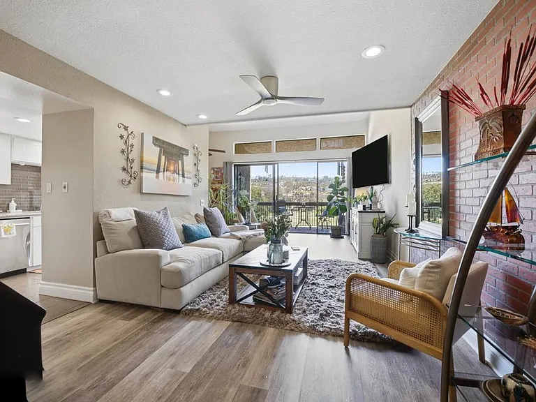 Couple exploring available homes with guidance from a real estate expert