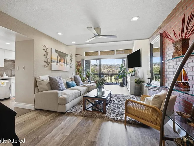Couple exploring available homes with guidance from a real estate expert