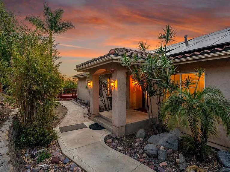 Real estate agent showing a property to homebuyers during a house tour